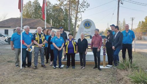 The Lions Club of Land O’Lakes celebrated their history at the unveiling ot the friendship arch in Northbrook on April 12.